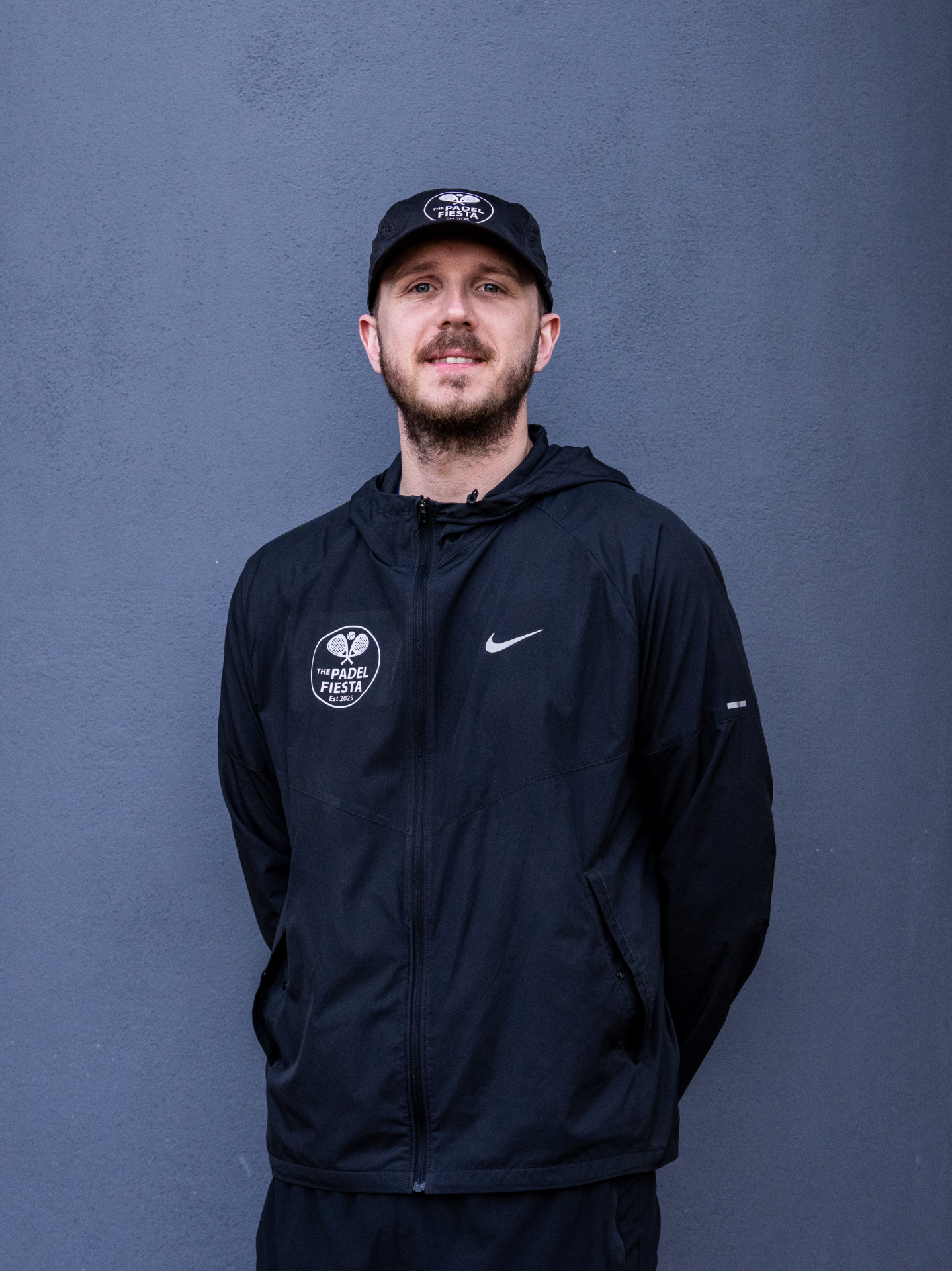 Padel Fiesta host in branded kit ready to welcome guests